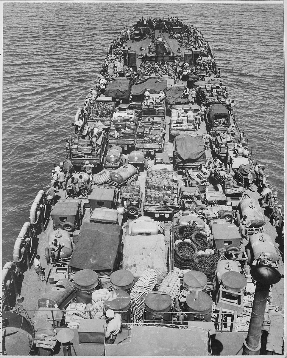 A Coast Guard manned LST loaded with Marines nears Cape Gloucester, December 24, 1943